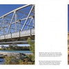 A steel truss bridge spans a river on the left, while a historic clock tower building—symbols of Texas Hill Country’s legacy—stands beneath a blue sky on the right in Schiffer Publishing, Ltd.’s Texas Hill Country.