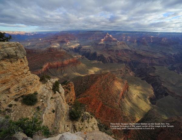 Southwest Reflections from Schiffer Publishing, Ltd. captures the Grand Canyon’s vast landscape near the Navajo Nation—cloudy skies above layered red-brown rocks, deep valleys, sparse cliffside vegetation, and sunlight highlighting the canyon floor.