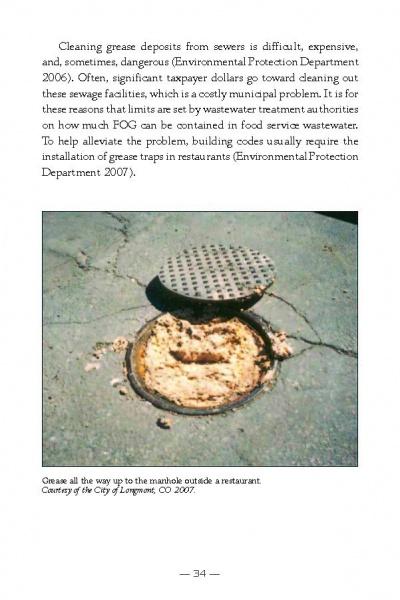 A manhole cover is pushed aside, exposing thick grease deposits nearly spilling onto the pavement—an overlooked resource discussed in Schiffer Publishing, Ltd.'s "Exploring Sustainable Biodiesel" for small-scale biodiesel production.