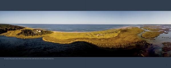 Art from above Cape Cod" by Schiffer Publishing, Ltd. showcases a panoramic aerial view of the Cape, with grassy land, sandy shores, and tidal flats stretching between shimmering waters beneath clear skies—a breathtaking drone photograph.