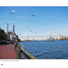 Experience the charm of Savannah, Georgia with "Savannah Perspectives" by Schiffer Publishing, Ltd.—featuring river views with seagulls, a bridge, a boat, red brick walkways, and historic sites along industrial buildings and trees.