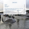 Two US Navy fast attack submarines are docked at a harbor with crew members on top. A translucent table of contents for "The US Navy's Fast Attack Submarines, Vol. 1" by Schiffer Publishing, Ltd. overlays the image.