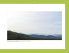 Experience spiritual self-discovery amid tranquil nature with Spiritual Gardens by Schiffer Publishing, Ltd.—a serene landscape of Tennessee’s Appalachian Mountains, green hills, and misty blue peaks beneath a pale sky.
