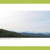 Experience spiritual self-discovery amid tranquil nature with Spiritual Gardens by Schiffer Publishing, Ltd.—a serene landscape of Tennessee’s Appalachian Mountains, green hills, and misty blue peaks beneath a pale sky.