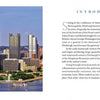 A cityscape photo of downtown Pittsburgh with tall buildings, water, a fountain, and park graces "Pittsburgh" by Schiffer Publishing, Ltd.—an ideal photography book capturing the city's history and cultural rebirth.