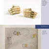 The William Spratling Legacy by Schiffer Publishing, Ltd. is displayed above a design sketch with front and side views on a white and beige background, accompanied by descriptive text about the earrings.
