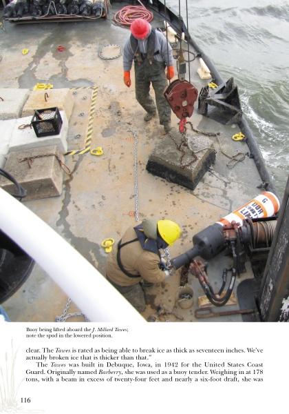 Two crew members in safety gear use chains and a crane to lift ice aboard a seafood boat on the Chesapeake Bay, surrounded by yellow ropes and equipment. Photo from "Chesapeake Men" by Schiffer Publishing, Ltd.
