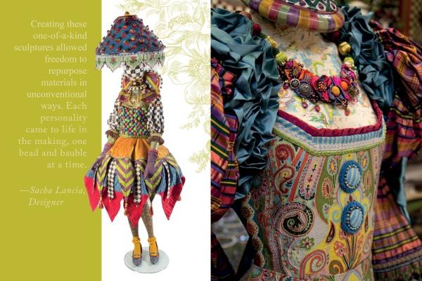 A mannequin in a vibrant, handcrafted-style outfit with patterns, beads, and a lampshade hat echoes the intricate details and layered textures of "Celebrating MacKenzie-Childs" by Schiffer Publishing, Ltd.