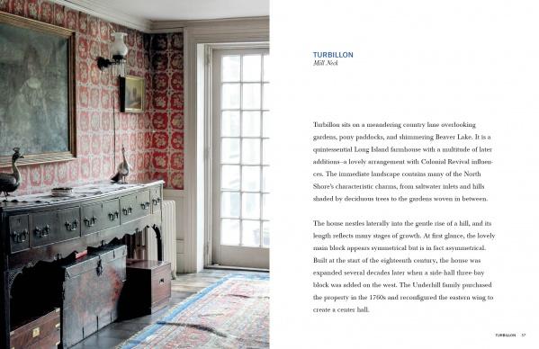 The Americana by Schiffer Publishing, Ltd. evokes vintage charm with patterned red wallpaper, a dark wood sideboard, and a round mirror. Sunlight through a glass door highlights this cozy, historic-inspired interior.