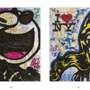 Uptown & Downtown" by Schiffer Publishing, Ltd. showcases vibrant graffiti art: a black-and-white smiling cat on the left and a woman’s face with I ♥ NY on the right, both set against New York subway maps—perfect for street art lovers.