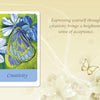 The Inspiring Butterflies card from Schiffer Publishing, Ltd. features a colorful butterfly and blue flowers with the label "Creativity"—reminding you that expressing yourself creatively inspires acceptance. Perfect for butterfly card lovers.