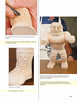 A collage shows hand-carved boot laces, a finished wooden boot, and a muscular wooden wrestler figure on a table. "Carving Mexican Wrestlers" by Schiffer Publishing, Ltd. includes text instructions on the page.