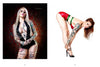 Two tattooed women strike bold pinup poses, one in a black bodysuit and the other in red and green latex, echoing Robert Alvarado's style. Featured in "Alvarado's All-American Girls" by Schiffer Publishing, Ltd.