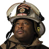 A firefighter in full gear and a white Sparta Hancock Co Station Chief helmet looks upward. This striking image, from "Local Heroes" by Schiffer Publishing, Ltd., captures the dedication of volunteer firemen.