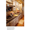 The remodeled kitchen, inspired by "Gracious Living" from Schiffer Publishing, Ltd., features wooden cabinets, a gas stovetop, stainless steel range hood, sink, countertop appliances, and a rug on hardwood floors for an accessible, organized space.