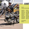 A custom motorcycle with flame detailing is parked among others at an outdoor event, reflecting biker spirit. To the right is a yellow table of contents for "The Meaning of Life According to Bikers" by Schiffer Publishing, Ltd.