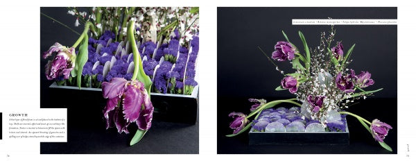 Perishable Poetics by Schiffer Publishing, Ltd. showcases a striking display of deep purple parrot tulips, baby’s breath, and purple blooms, arranged upright and cascading in a rectangular tray against a bold black background.