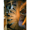 A close-up view looking down a handcrafted wooden spiral staircase with sculptural wood details in warm brown tones, featured in "Wharton Esherick Studio & Collection" from Schiffer Publishing, Ltd.