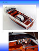 Fundamentals of Model Boat Building by Schiffer Publishing, Ltd. details creating vintage wooden motorboats with white trim, red seats, chrome accents, and classic dashboards featuring gauges, steering wheels, and wood paneling.