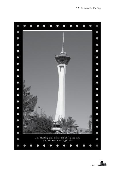 Black-and-white photo of the Stratosphere Tower rises above Las Vegas, evoking haunted tales. From "Ghosts, Gangsters, and Gamblers of Las Vegas" by Schiffer Publishing, Ltd., framed with a dotted border against a clear sky.