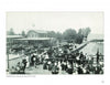 A crowd in early 20th-century attire waits near a dock for the excursion boat Colonial at Belle Isle, evoking vintage postcards from "Colonial Beach, Virginia" by Schiffer Publishing, Ltd., with a building and trees in the background.