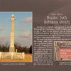 A tall stone monument with a sphere atop rises behind a white fence at East Cavalry Battlefield, featured in "Haunted Gettysburg" by Schiffer Publishing, Ltd., which also recounts a Holiday Inn bathroom ghost story nearby.