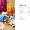 A colorful mix of fabric bags, wooden toy cars, and blocks are spread on a wooden floor. On the right, a contents page lists chapters for "Print It!" by Schiffer Publishing, Ltd., a kids crafts book with fun printmaking projects.