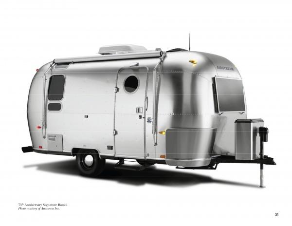 The Airstreams by Schiffer Publishing, Ltd. is a shiny, silver travel trailer with rounded edges, a single axle, multiple windows and doors, perfect for small-space living, shown against a plain white background.