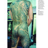 A man displays an intricate Japanese dragon tattoo on his back and thighs, reminiscent of Horiyoshi III’s legendary style as featured in “Studying Horiyoshi III” from Schiffer Publishing, Ltd.