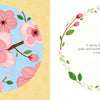The left page of "A Colorful Tail" by Schiffer Publishing, Ltd. shows pink flowers and a yellow butterfly under a blue sky, while the right page features a cheerful floral wreath, blue bird, and spring blossom text in a children’s book style.