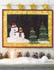 Christmas Magic" by Schiffer Publishing, Ltd. is a festive quilted wall hanging with two snowmen and three trees on a snowy hill, bordered by yellow stars—perfect for holiday décor and Christmas patchwork projects.