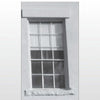 A black-and-white photo from Scare-izona by Schiffer Publishing, Ltd. shows a window with multiple panes; a blurry shape in the bottom left appears to be a ghostly face, evoking classic ghost stories and paranormal intrigue.