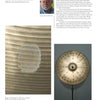 A page from Schiffer Publishing, Ltd.’s "100 Artists of Washington, D.C." highlights Robin Rose with a headshot, brief bio, and two circular abstract works—showcasing textured patterns and muted colors for DC art enthusiasts or collectors.