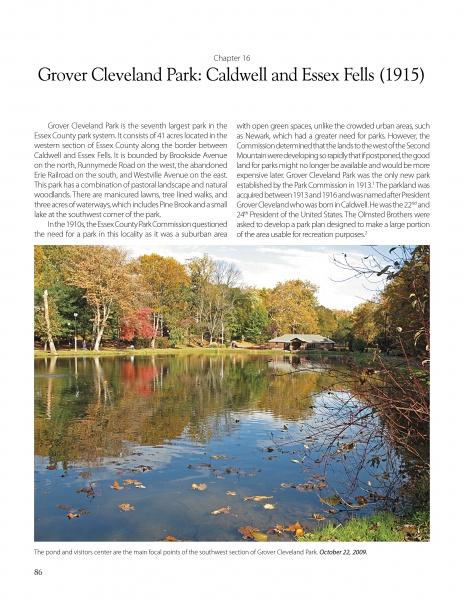 A scenic pond in Grover Cleveland Park, featured in "Olmsted Parks in New Jersey" by Schiffer Publishing, Ltd., reflects autumn colors. A path and benches border the water as people stroll under a clear blue sky.