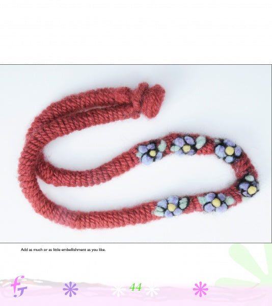 Making Simple Felted Jewelry by Schiffer Publishing, Ltd. features fiber art with vibrant bead clusters arranged along a handmade red knitted necklace, beautifully displayed on a white background.