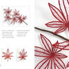 A spread from "Organic Embroidery" by Schiffer Publishing, Ltd. shows step-by-step instructions and images for making Japanese maple leaves with red and brown thread, plus a close-up of finished delicate embroidered leaves.