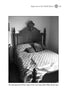 Black and white photo of a neatly made bed with a patterned quilt and a tall, ornate wooden headboard, evoking the mysterious charm of Maryland legends from "Ghosts of Maryland" by Schiffer Publishing, Ltd. Sunlight highlights the bed’s shape and texture.