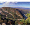 A high-angle view of a river winding through Delaware Water Gap National Recreation Area, featured by Schiffer Publishing, Ltd.