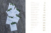 On the left, five cards with handwritten names and leafy accents rest on stone. On the right, "The White Dress Destinations" by Schiffer Publishing, Ltd. displays its gold-highlighted table of contents on a white background.