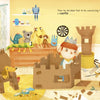 A child wearing a paper crown builds a cardboard castle in a colorful room, inspired by "King of Boredom" from Schiffer Publishing, Ltd., surrounded by stuffed animals and crafts. The wall reads, “Then he decided that to be convincing he had to have a castle...”.