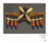 This WWII Bakelite Jewelry by Schiffer Publishing, Ltd. features a patriotic airplane pin with a gold "USA" and "ARMY" propeller and six bombs labeled: NAZI, STALIN, HITLER, BENITO, JAPAN, and TOJO.