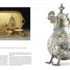 Beyond Fabergé" by Schiffer Publishing, Ltd. showcases ornate silver and gold tableware—cups, bowls, and containers crafted by imperial Russian jewelers, plus a lion’s head spouted pitcher inspired by Romanov splendor.