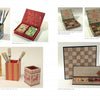 Photo of boxes and containers featured in "Constructing and Covering Boxes" by Schiffer Publishing, Ltd., including pencil and brush holders, a marbled snack box, jewelry/gift box, and chess set—all with intricate printed patterns on a white background.