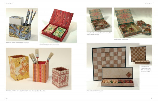 Photo of boxes and containers featured in "Constructing and Covering Boxes" by Schiffer Publishing, Ltd., including pencil and brush holders, a marbled snack box, jewelry/gift box, and chess set—all with intricate printed patterns on a white background.