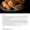 A plate with roasted chicken sits next to a bowl of brown eggs on a dark surface. Below is a New England-inspired roast chicken recipe, featuring a brief history, from "The Culinary Lives of John & Abigail Adams" by Schiffer Publishing, Ltd.