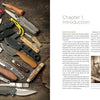 Several folding knives and multitools are arranged on a rustic wood surface beside an open copy of "The Big Book of Knives" by Schiffer Publishing, Ltd., turned to Chapter 1 and featuring a sepia photo of someone sharpening a knife.