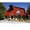 “The Unlikely Story of the Museum of Appalachia and How It Came To Be” by Schiffer Publishing, Ltd. explores Southern Appalachian culture, as seen in the museum’s barn-style building with a quilt pattern above the entrance, pumpkins, flowers, and greenery.