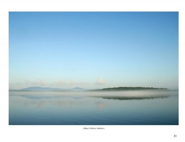 Schiffer Publishing, Ltd.’s "Maine" captures the peaceful beauty of classic Maine landscapes—glassy lakes beneath clear blue skies, gentle mist over the water, and distant green hills along the horizon.