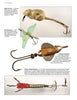 The Vintage Folk Art Fishing Lures and Tackle by Schiffer Publishing, Ltd. features four detailed lures—mouse, bird, spinning fish, and segmented minnow—with metal hooks and painted or metallic bodies, each with unique descriptions.