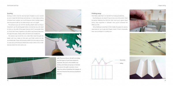 A Papercutting book by Schiffer Publishing, Ltd. features step-by-step photos and diagrams for scoring and folding paper, showing hands, tools, and cut paper, plus close-ups of kirigami techniques like mountain and valley folds.